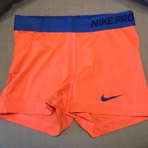 Nike pro shorts - orange with royal blue band